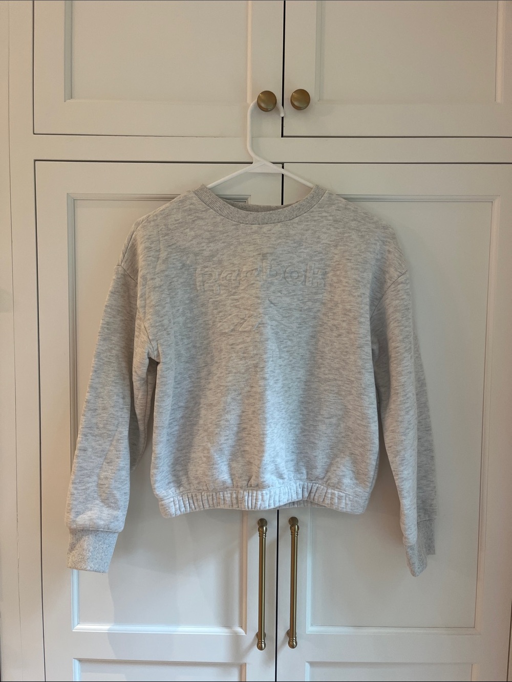 Kids Reebok gray sweatshirt size L.